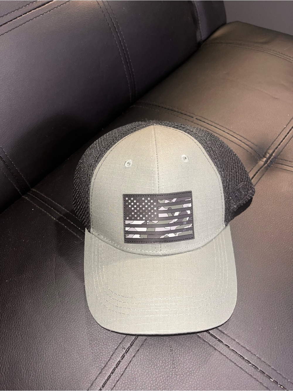 Highland Tactical Men's Olive and Black Trucker Cap with Camo Flag Patch